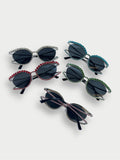 DIAMONTÈ Oval Sunglasses image 0