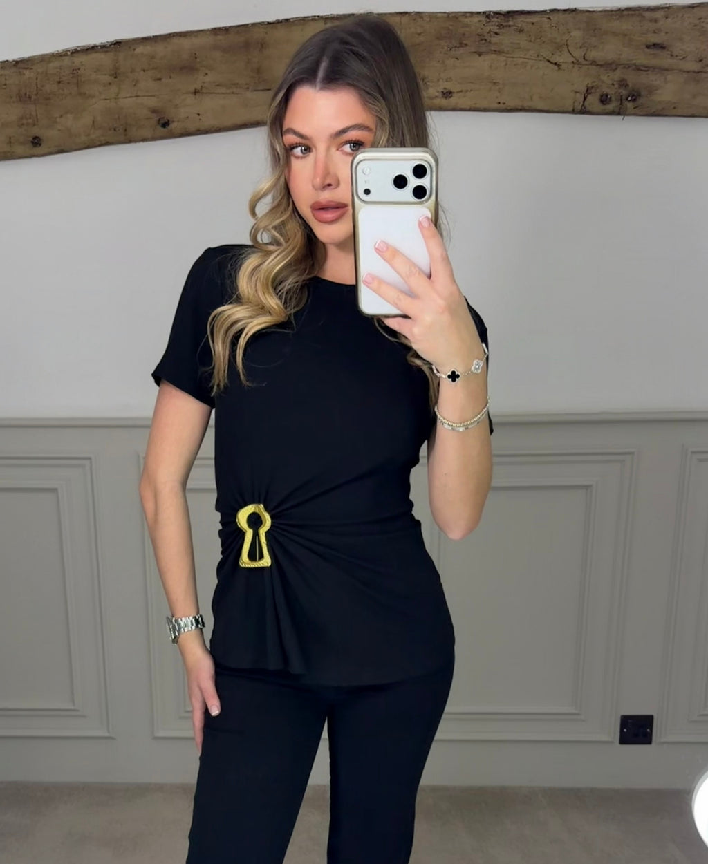 PIRELLI black t-shirt with gold keyhole detail