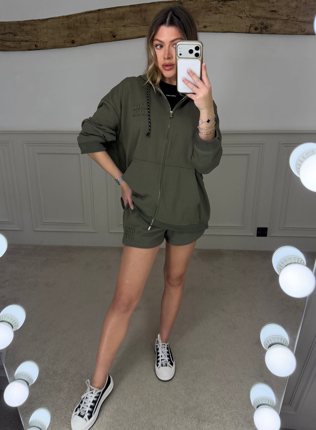 Khaki oversized hoodie worn with matching shorts