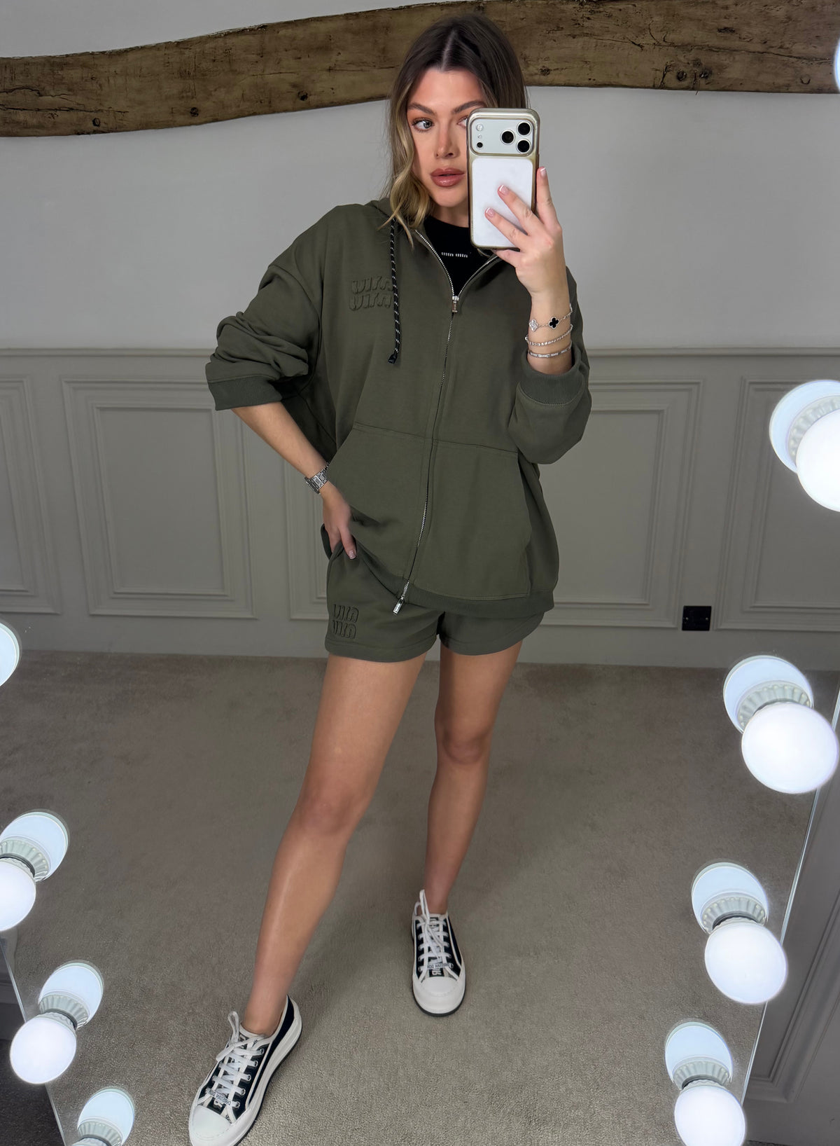 Khaki oversized hoodie worn with matching shorts