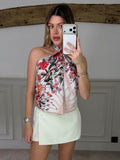 Powder pink flower and moon print 90cm scarf styled as a top