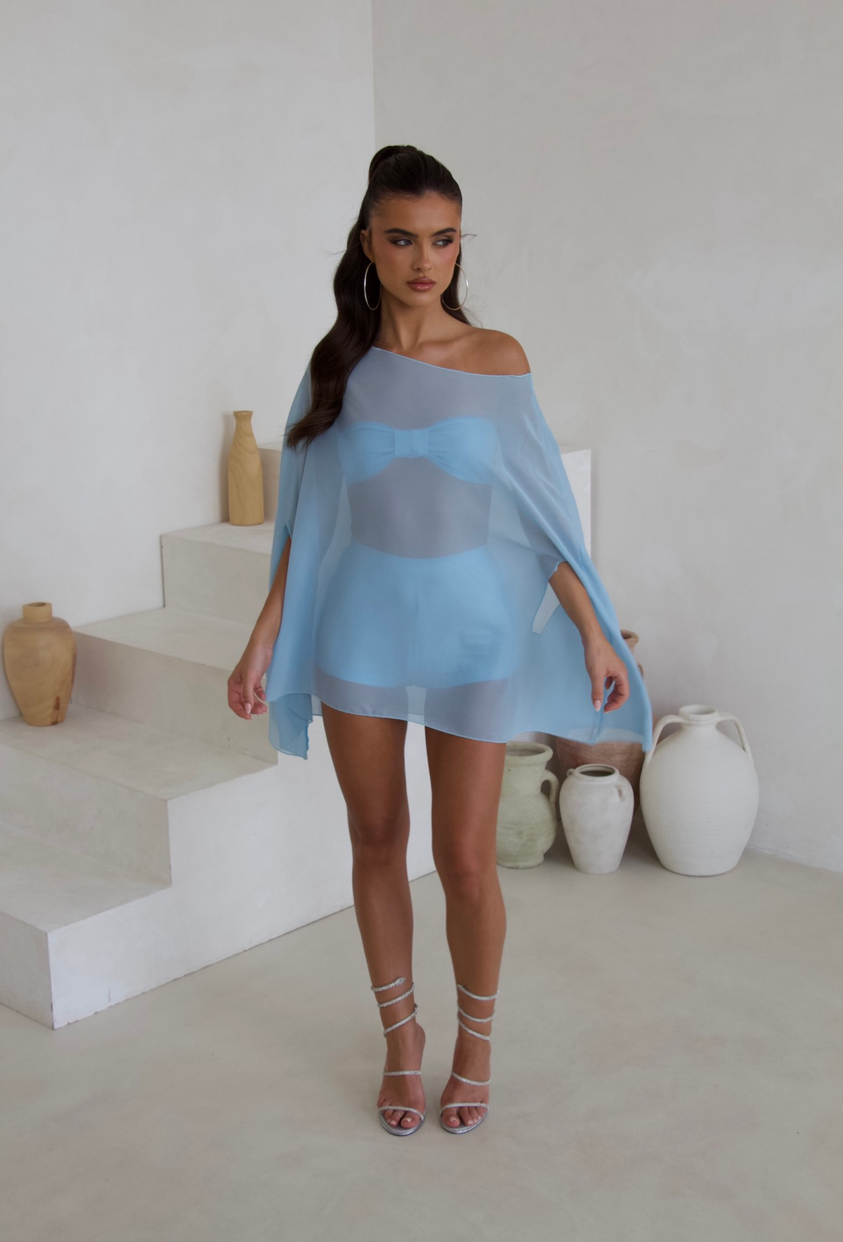 Blue bandeau and shorts, side view