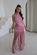 Model wearing the SWAY pink tassel fringe bandage dress, front view
