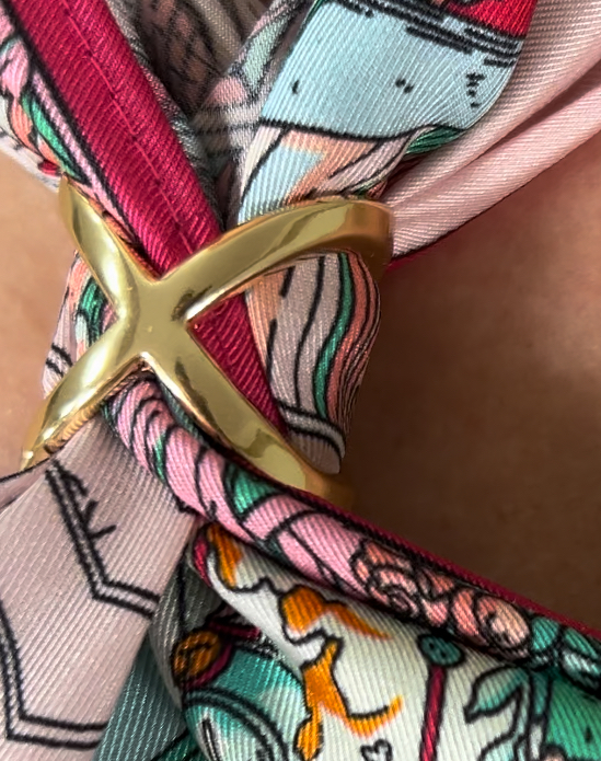 X scarf ring worn with a silk scarf
