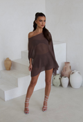 Model wearing the brown cape three piece bandeau and shorts set, front view