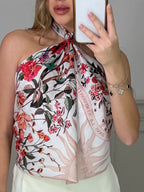 Powder pink scarf top styled with the floral print visible